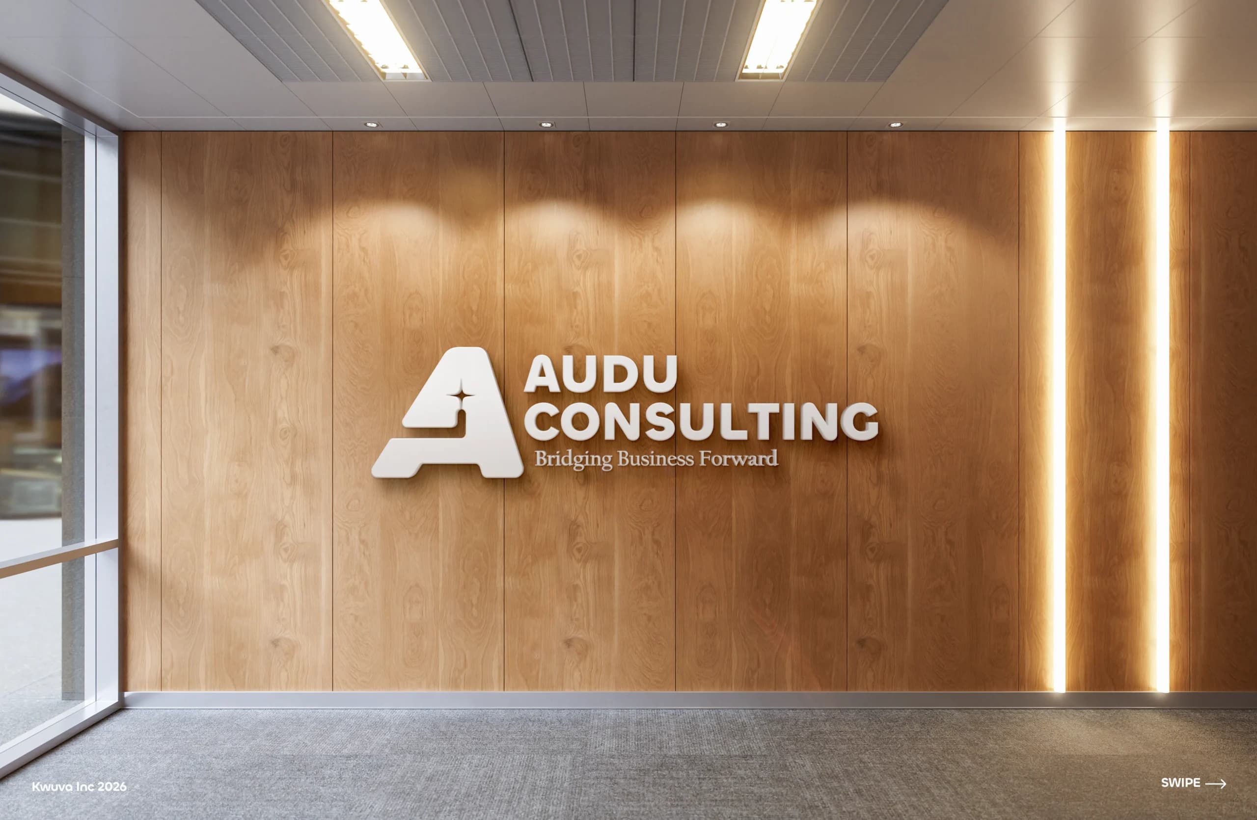 AUDU Consulting logo on a wood-panelled office wall