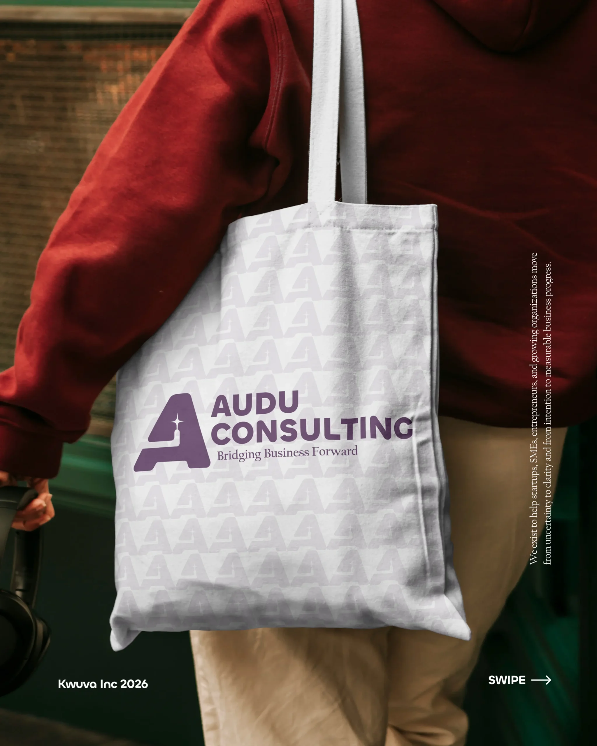 AUDU Consulting tote bag carried over the shoulder